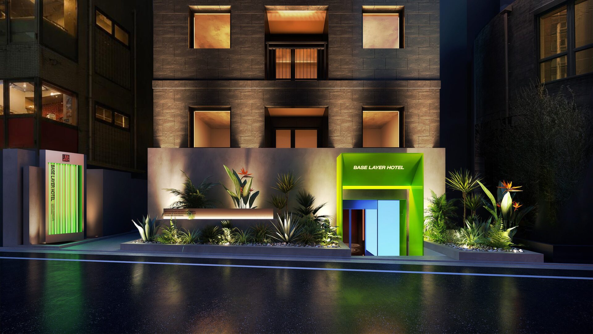 BASE LAYER HOTEL ROPPONGI 植物に囲まれた夜の建物外観